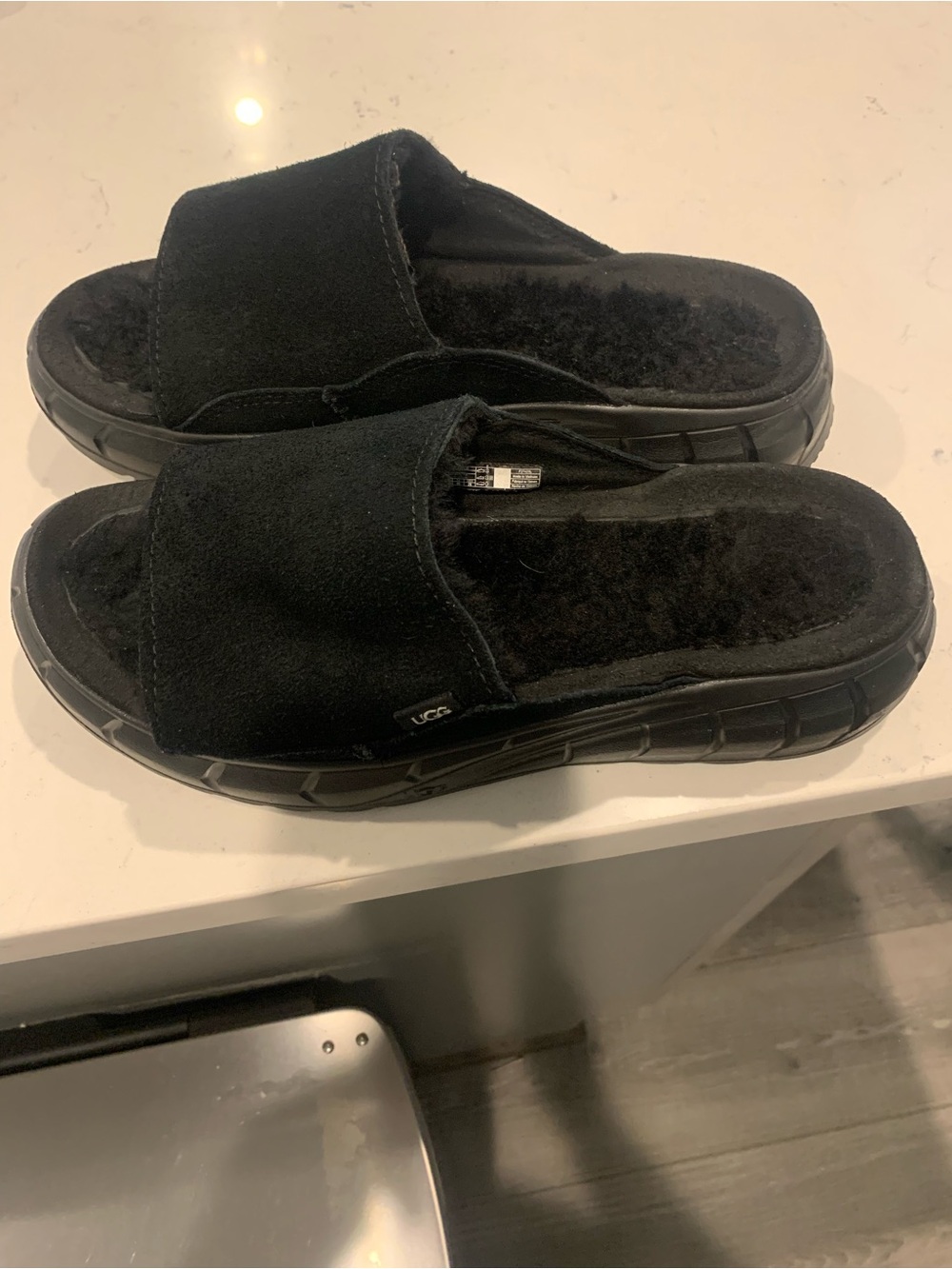 UGG Women’s Black Suede Slide Sandals with Fleece Lining